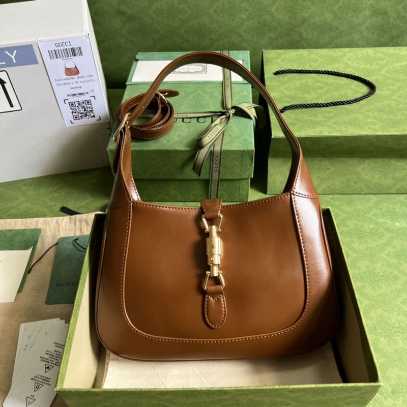 G*u*i top handle bags